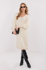 robe pull midi oversize maille épaisse ivoire encolure V manches ballon épaules tombantes poignets côtelés élastiqués coupe droite ample moelleuse