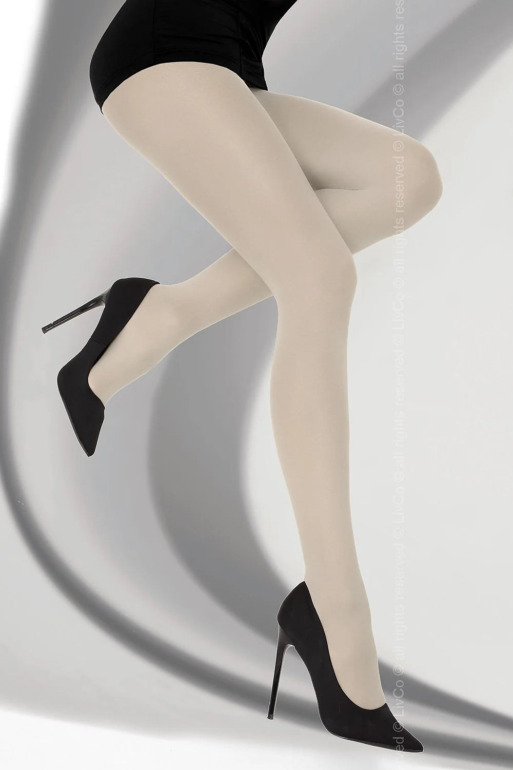Collant beige nylon élégant classique ajusté sophistiqué transparence douce finition uniforme accessoire mode féminin