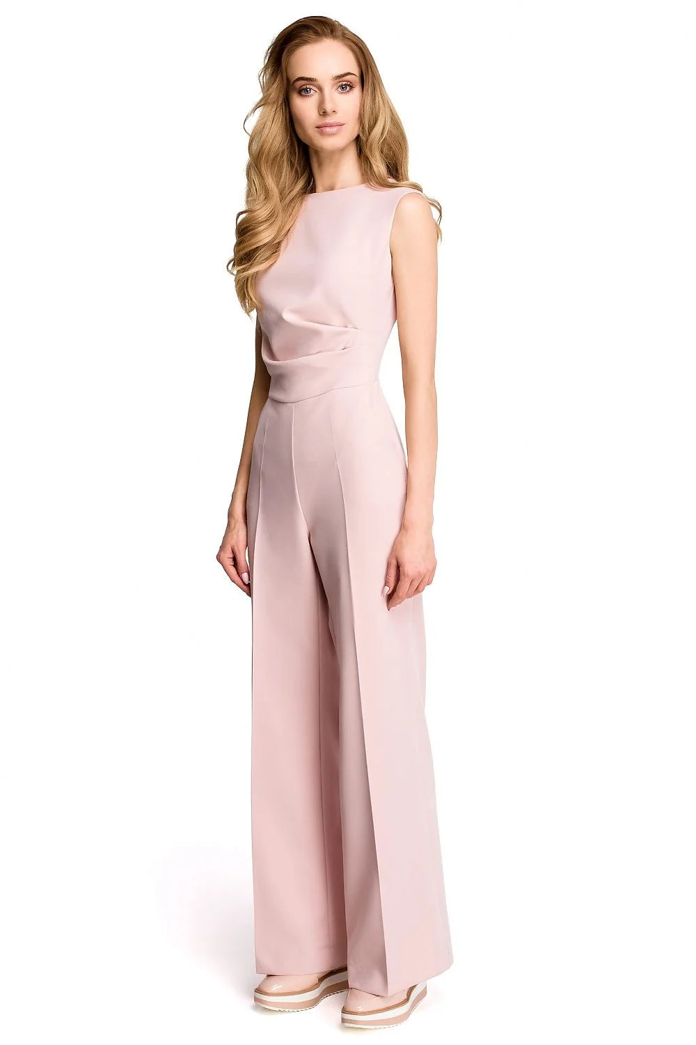 Combinaison femme élégante en polyester blanc sans manches, jambes évasées, style minimaliste moderne chic