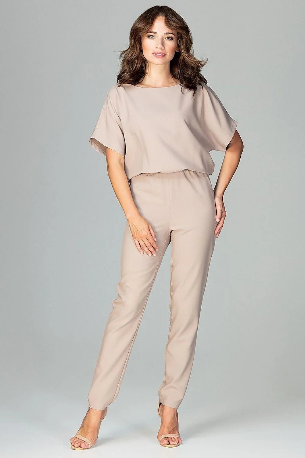 combinaison femme Lenitif vert émeraude fluide manches kimono courtes encolure bateau taille ajustée pantalon fuselé poches obliques fermeture zippée