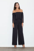 combinaison Figl pantalon noire épaules dénudées manches longues fendues haute palazzo jambes larges fluide structuré élégante allongeante soirée cocktail chic