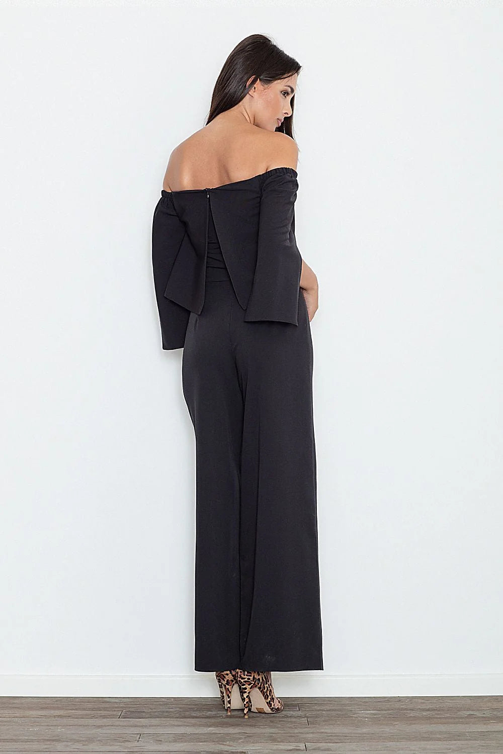 combinaison Figl pantalon noire épaules dénudées manches longues fendues haute palazzo jambes larges fluide structuré élégante allongeante soirée cocktail chic