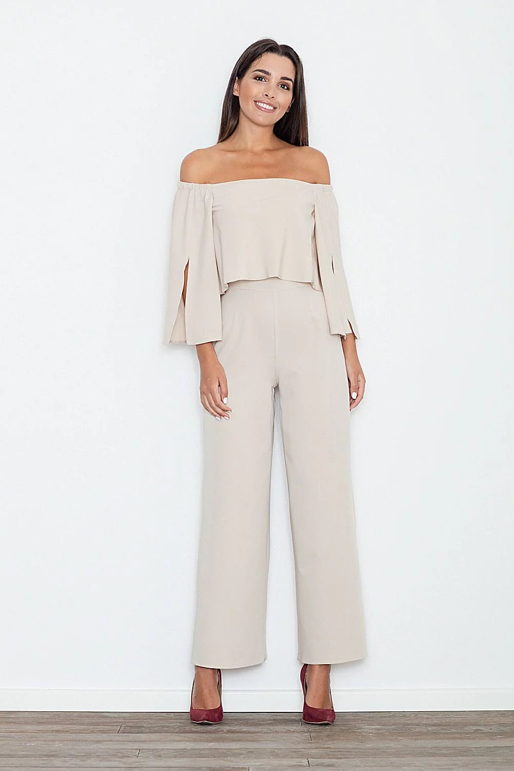 combinaison Figl pantalon noire épaules dénudées manches longues fendues haute palazzo jambes larges fluide structuré élégante allongeante soirée cocktail chic