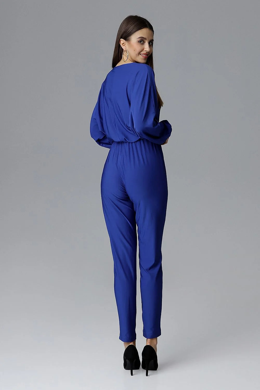 combinaison pantalon femme bleu électrique polyester élasthanne col V croisé manches longues poignets élastiques taille élastique coupe ajustée jambes fuselées
