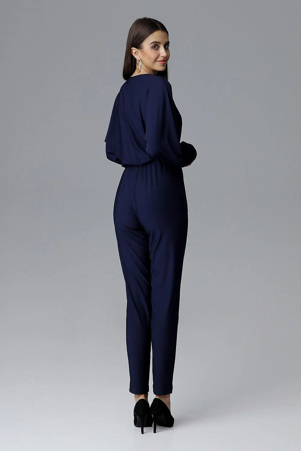 combinaison pantalon femme bleu électrique polyester élasthanne col V croisé manches longues poignets élastiques taille élastique coupe ajustée jambes fuselées