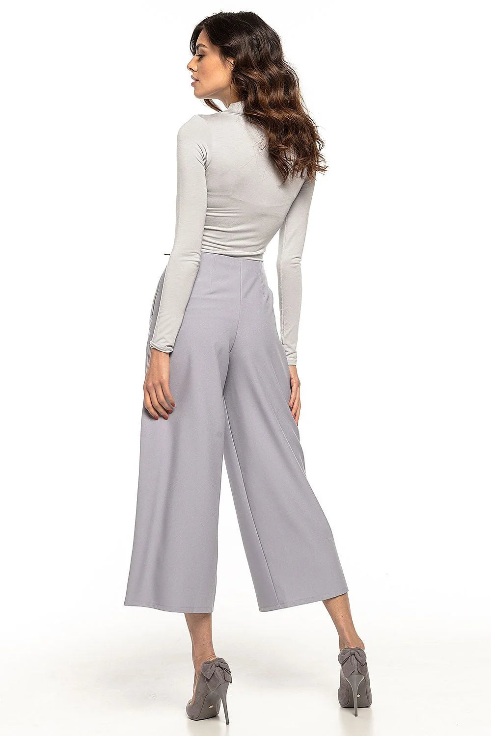 Pantalon femme en tissu épais style moderne coupe ample taille haute élégant et minimaliste