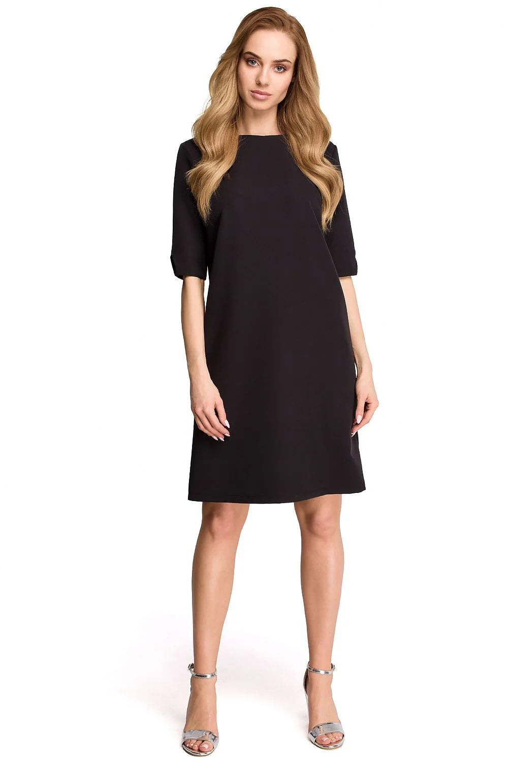 Robe noire élégante synthétique ample manches mi-longues col rond chic pour femmes modernes et stylées