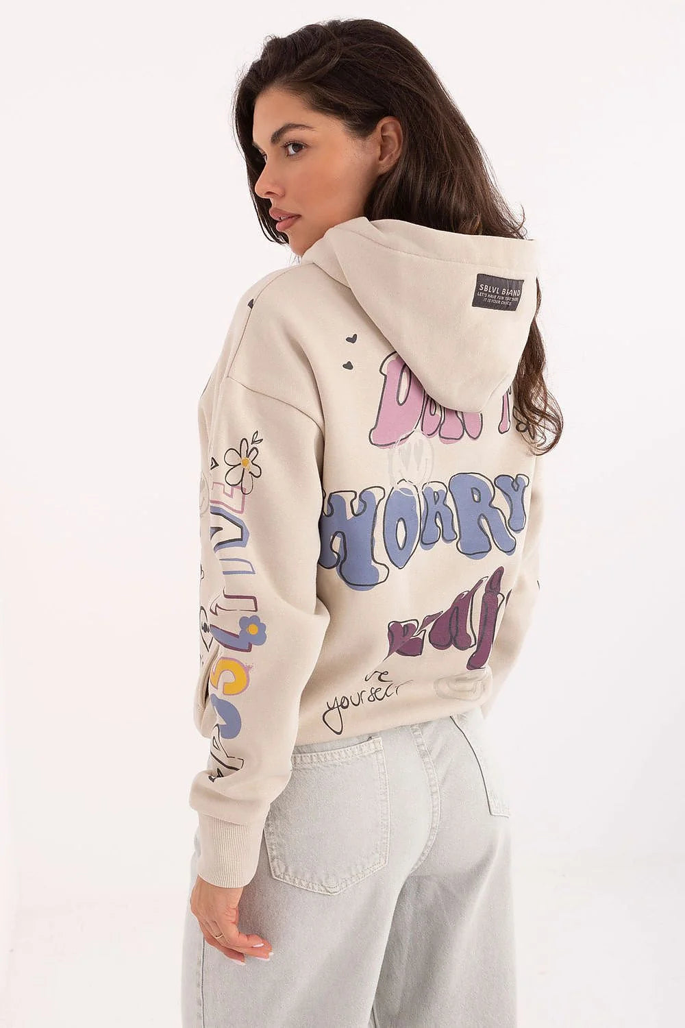 hoodie femme molletonné beige crème coupe relaxed courte capuche bords côtes manches longues poches latérales imprimés multicolores graphiques fleurs souriantes