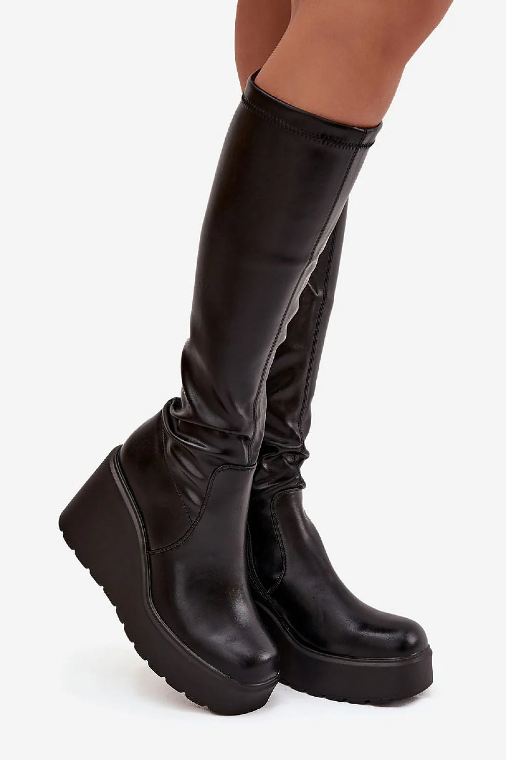 cuissardes bottes noir similicuir tigehaute boutarrondi froncecheville fermetureeclair taloncompense plateforme semellecrantee allureaffinante confortable stable urbaine minimaliste contemporaine tendance
