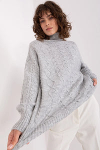 pull col roulé maille torsadée acrylique gris clair oversize ample manches longues tricot épais duveteux cosy
