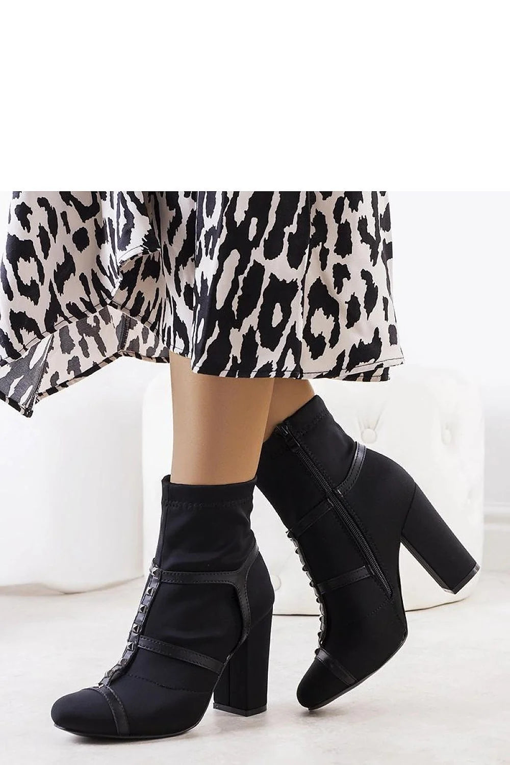 bottines noires cheville tige stretch simili cuir talon bloc épais carré confortables élégantes modernes sophistiquées fermeture éclair latérale maintien ajustable