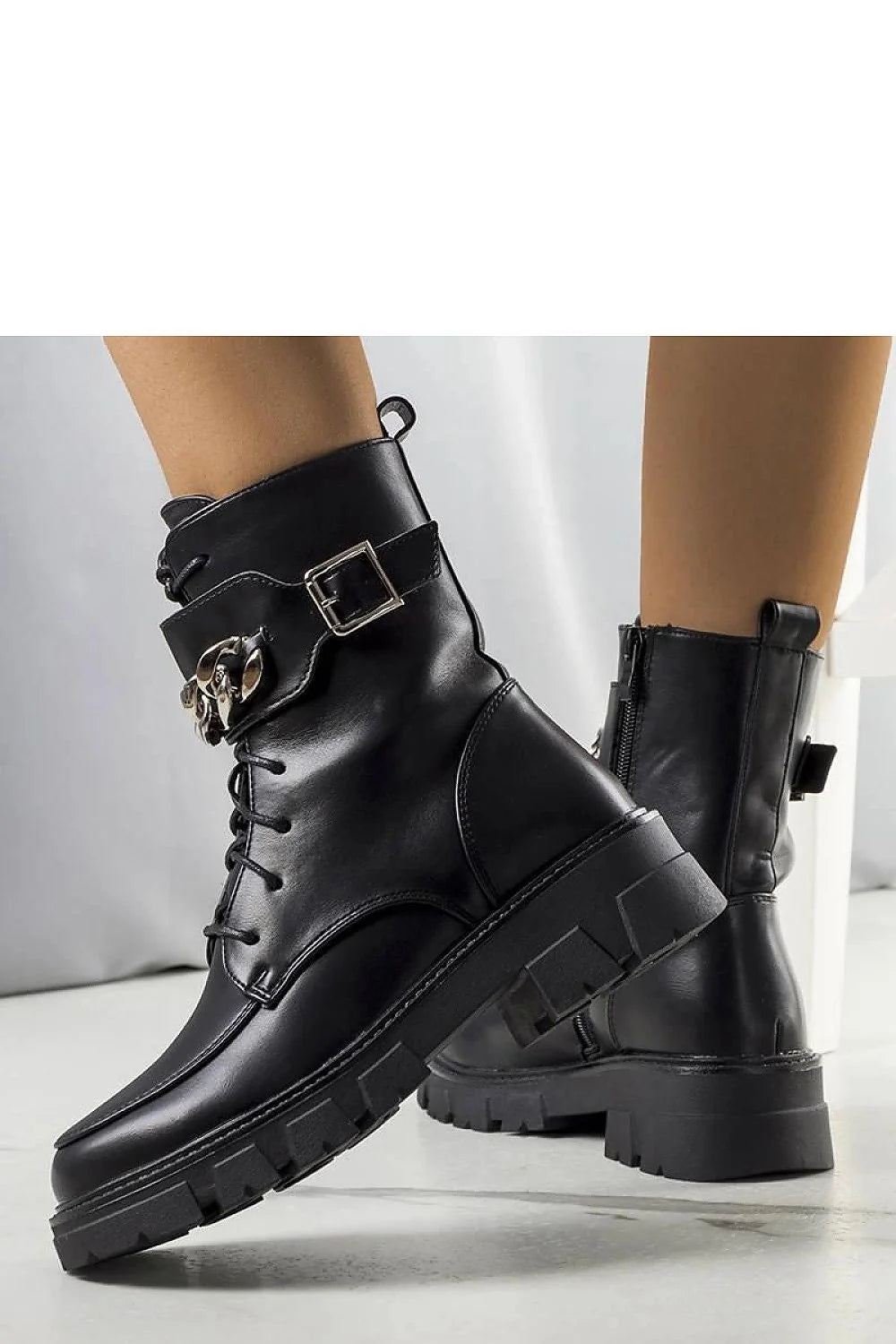 Bottes militaires noires en cuir synthétique avec chaîne métallique, lacets, semelle crantée et doublure fourrure imitation femme