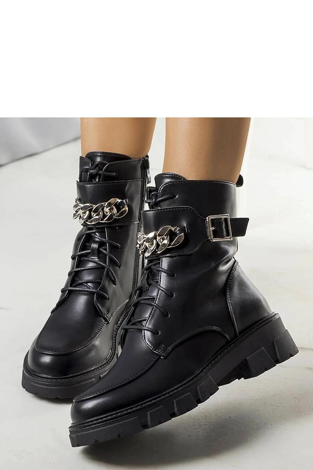 Bottes militaires noires en cuir synthétique avec chaîne métallique, lacets, semelle crantée et doublure fourrure imitation femme