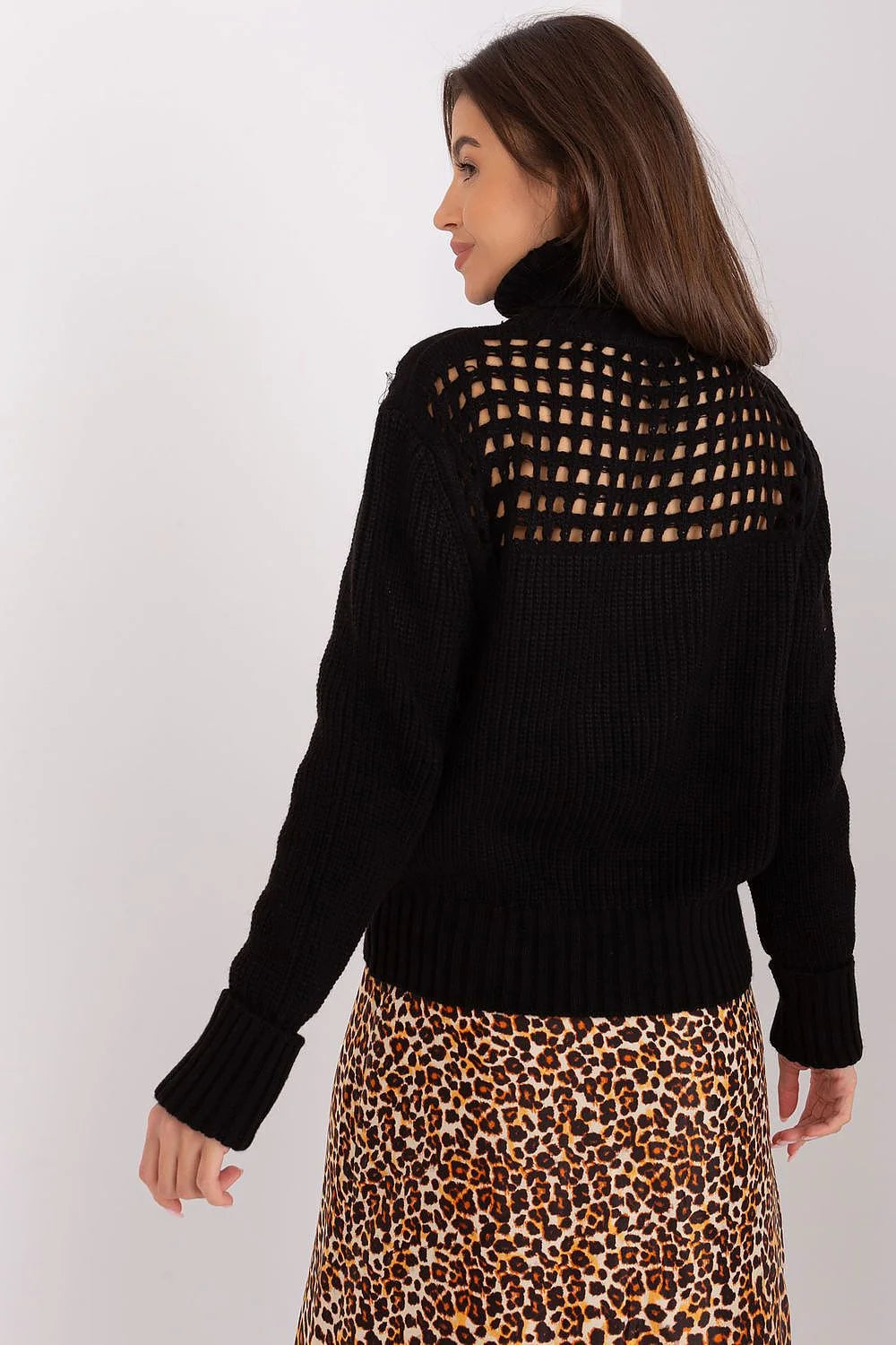 Pull à col roulé féminin maille ajourée côtelée noir ample manches longues élégance moderne mode hiver