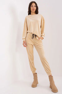 ensemble survêtements féminin beige clair velours satiné oversize sweat manches longues jogger taille élastiquée cordon noir poches latérales