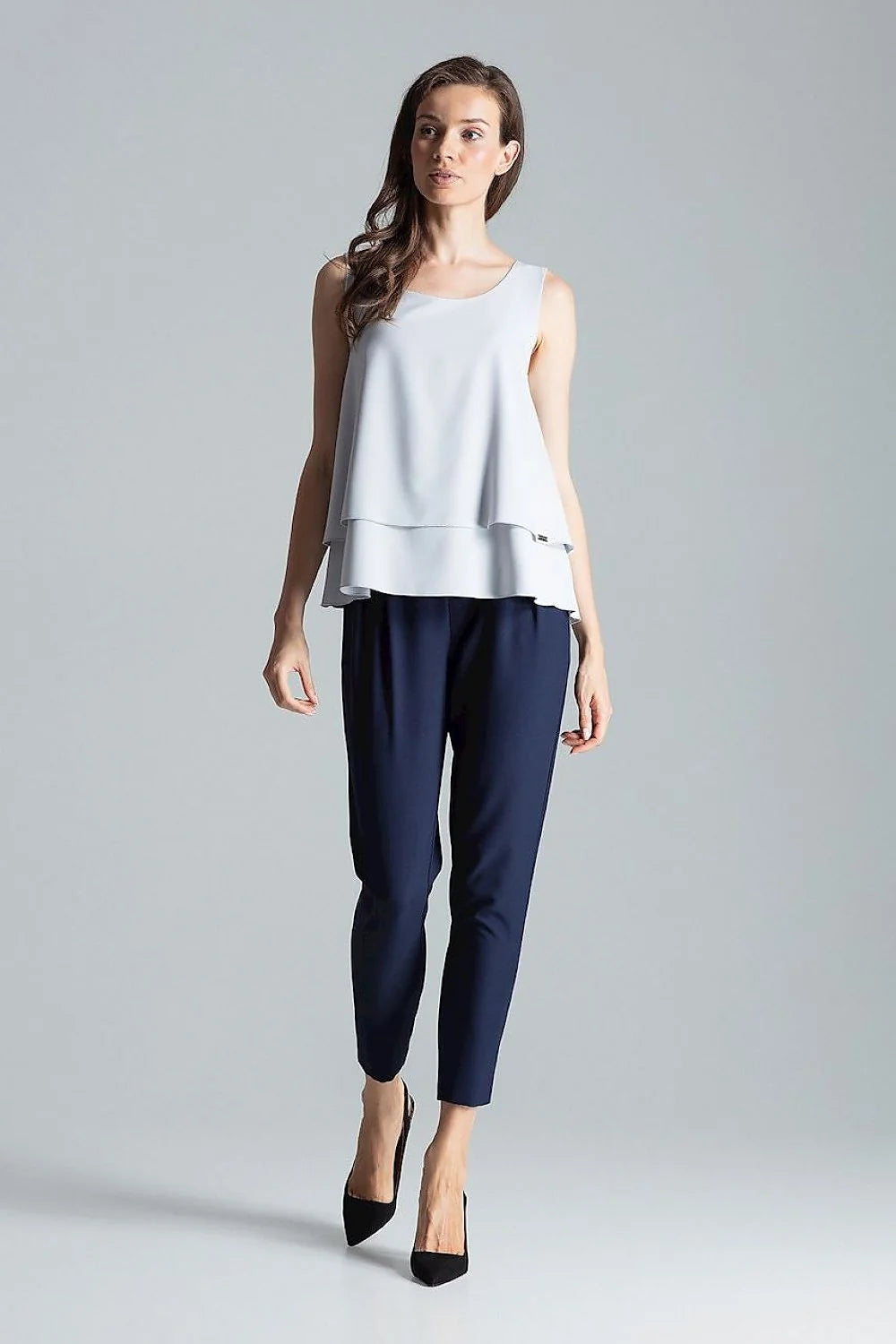 Haut élégant sans manches en polyester bleu marine coupe fluide superposition tissu femme moderne