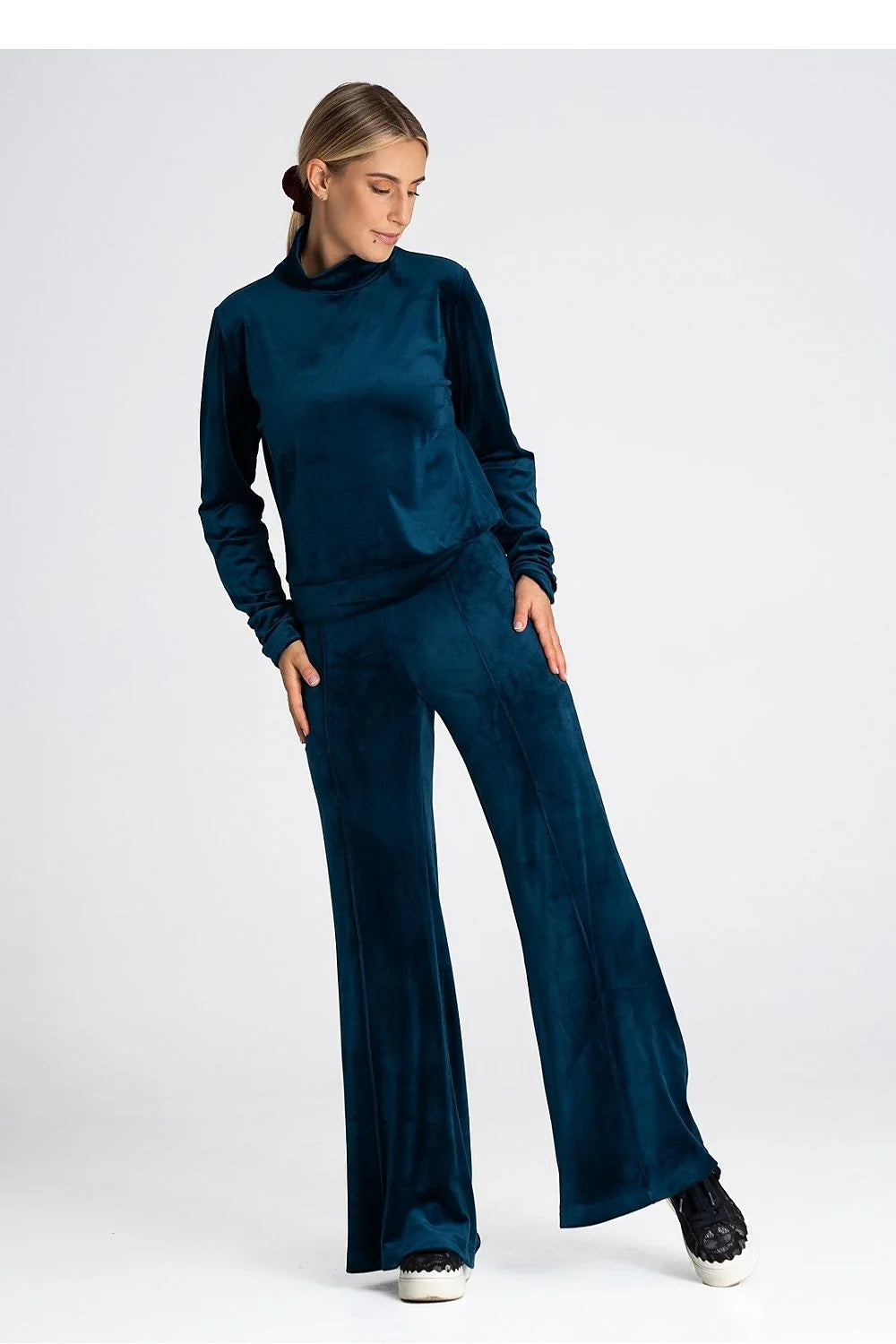 pantalon survêtement velours bleu pétrole taille haute ajustable coupe évasée jambe large doux brillant minimaliste sophistiqué confortable stretch finition discrète