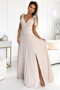 robe soirée longue encolure V bretelles nouées fente haute beige scintillant coupe portefeuille taille cintrée jupe évasée jersey extensible glamour
