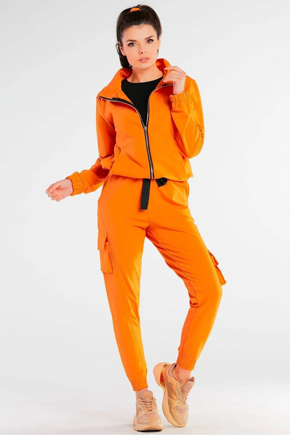 Ensemble sportif femme jaune fluo veste pantalon survêtement style moderne coupe ample col montant fermeture éclair élasthanne polyester respirant