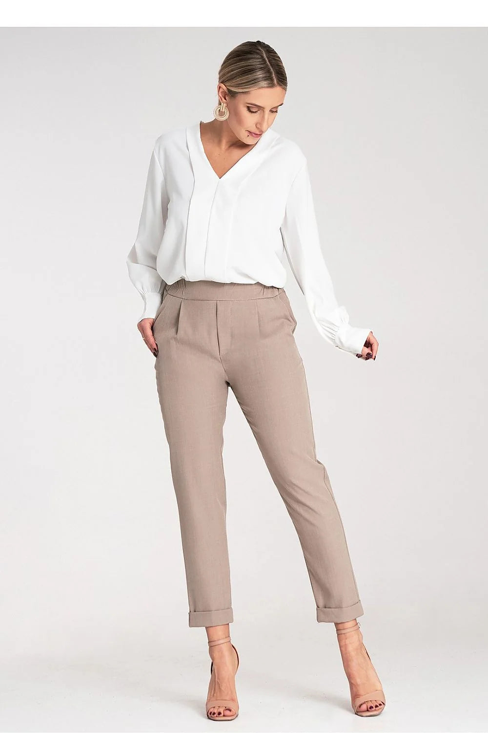 pantalon femme coupe ajustée ourlet retroussé taille haute ceinture élastique polyester elasthanne poches latérales fuselé confortable élégant moderne