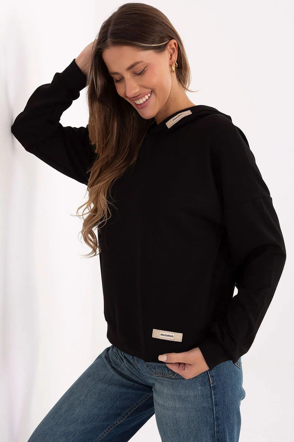 sweatshirt capuche femme noir décontracté oversize manches longues emmanchures tombantes molleton doux lisse viscose polyester elasthanne bordcotes poignets logos discrets
