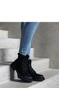 Bottes Solea pour femmes en cuir et suède noires design industriel robuste et tendance