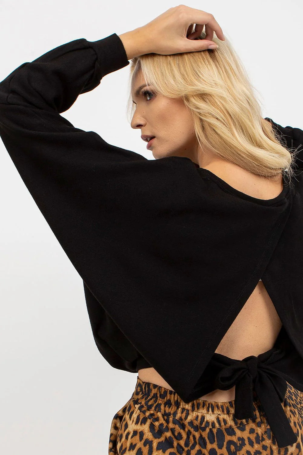 ensemble haut pantalon imprimé léopard oversize col rond manches longues noir brun fauve acrylique doux confortable élégant audacieux sophistiqué moderne