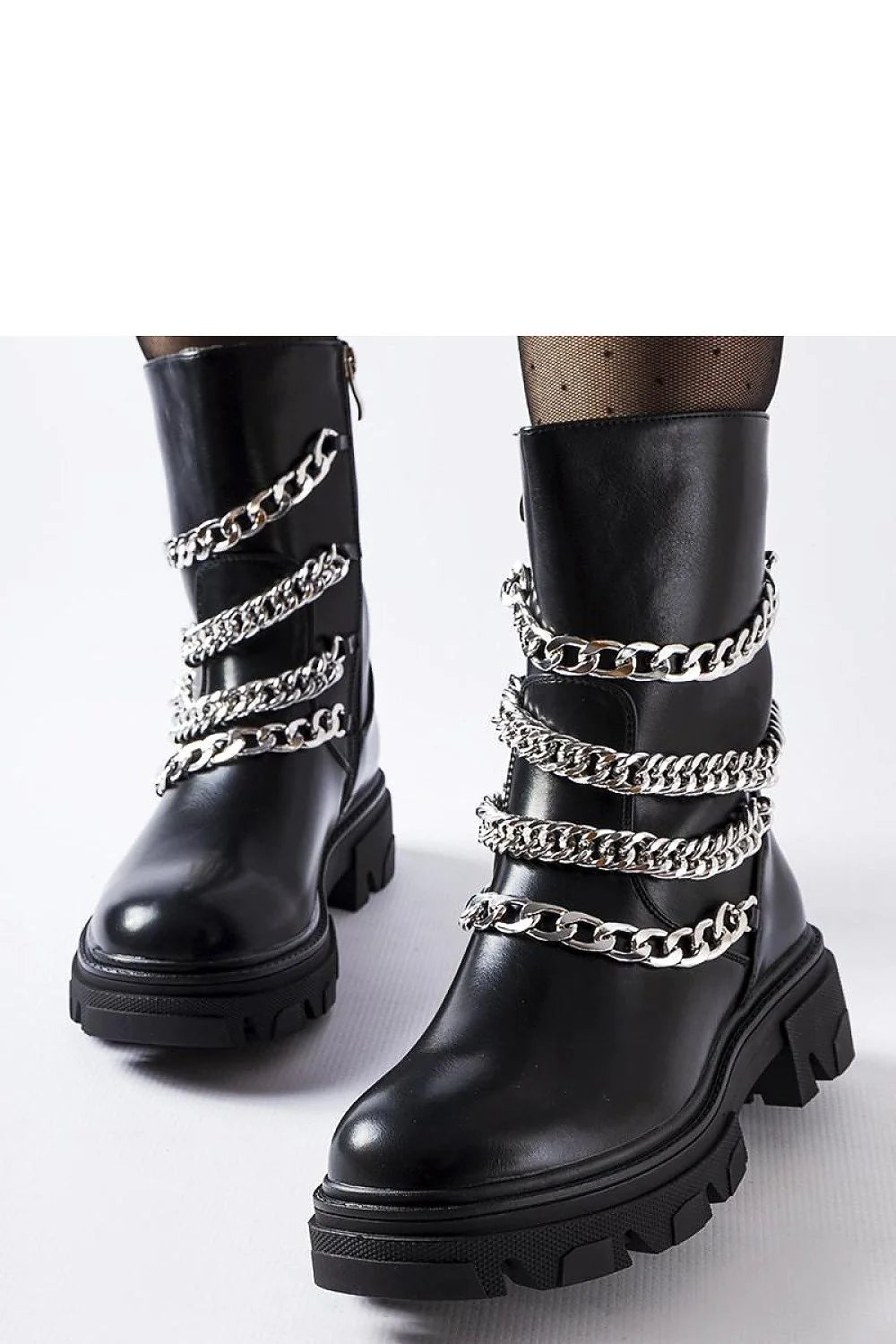 Bottes audacieuses pour femmes cuir noir chaînes métalliques design contemporain talon moyen zip latéral
