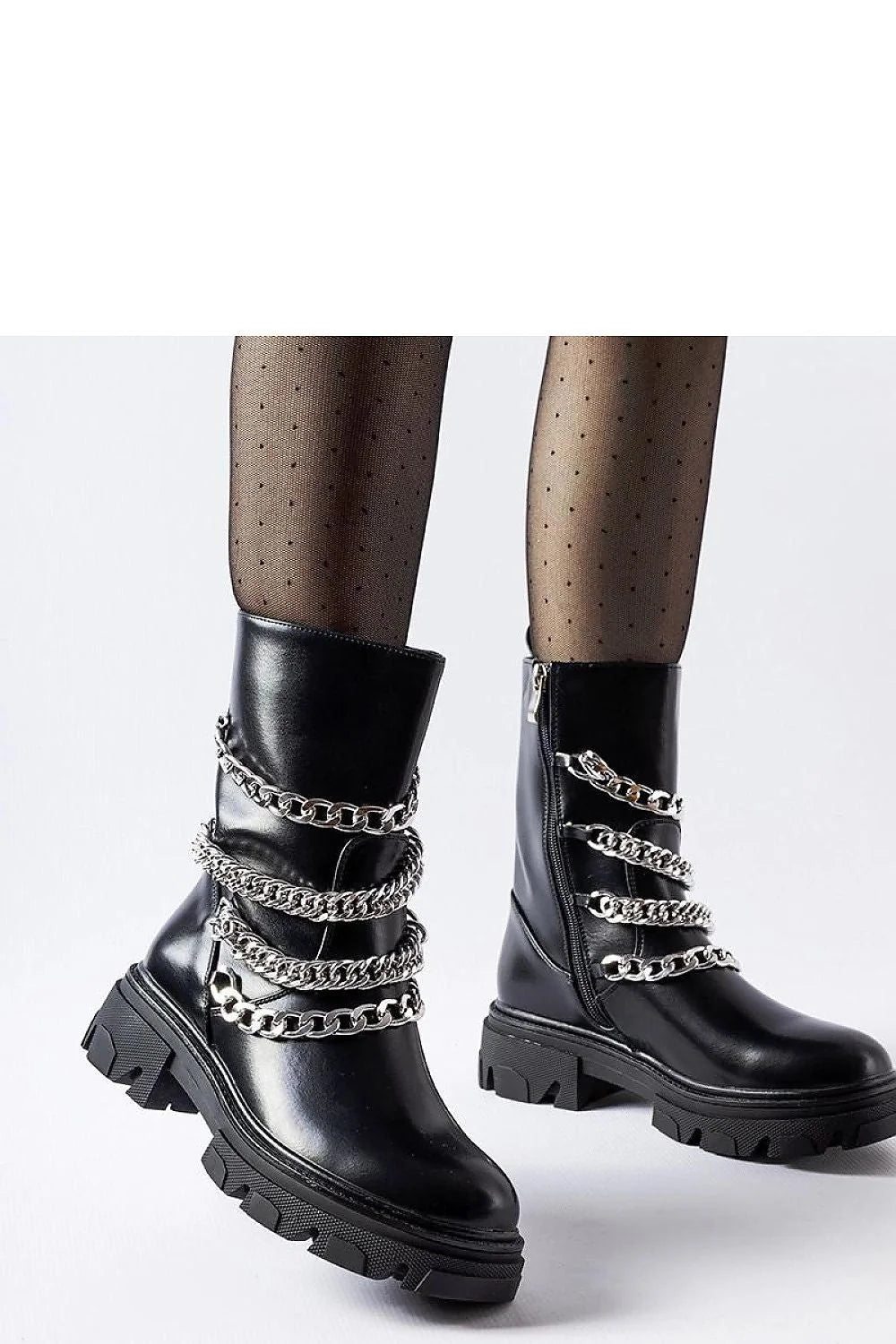 Bottes audacieuses pour femmes cuir noir chaînes métalliques design contemporain talon moyen zip latéral