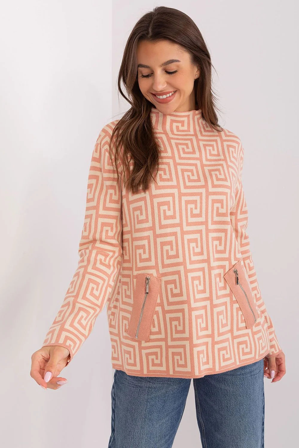 Haut féminin motif géométrique manches longues col montant zips latéraux rose pâle blanc crème