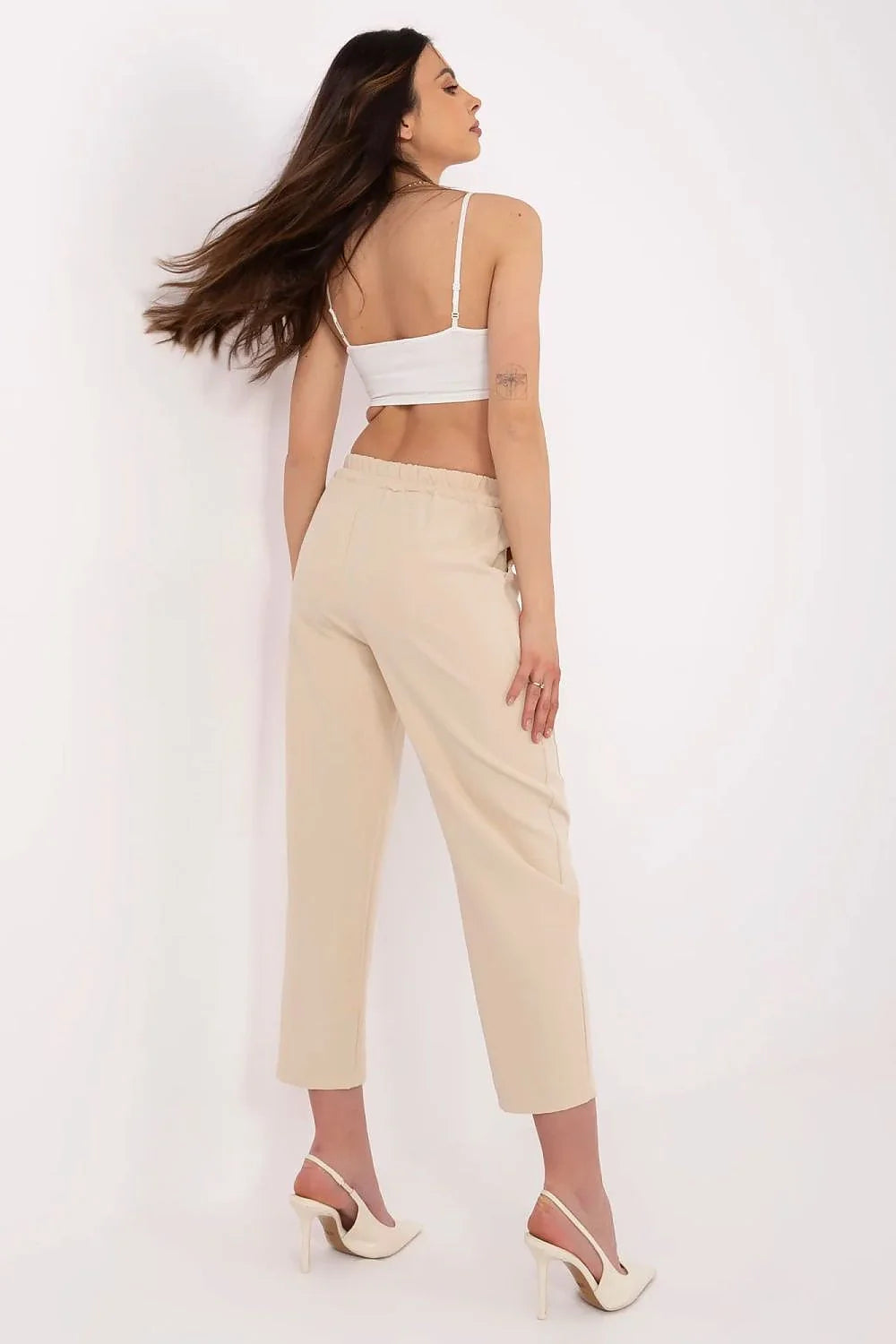 Pantalon femme cigarette高 taille élastiquée beige polyélastane jambes fuselées poches latérales ajusté moderne élégant casual office quotidien