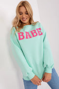 Sweatshirt Femme Design BABE Manches Longues Coupe Relâchée Vert Pastel Lettrage Rose Matériau Coton Polyester Confort Durable