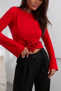 chemisier IVON élégant féminin manches longues évasées col rond crop ajusté rouge coton élasthanne extensible fleur appliquée volumineuse poignets effilochés