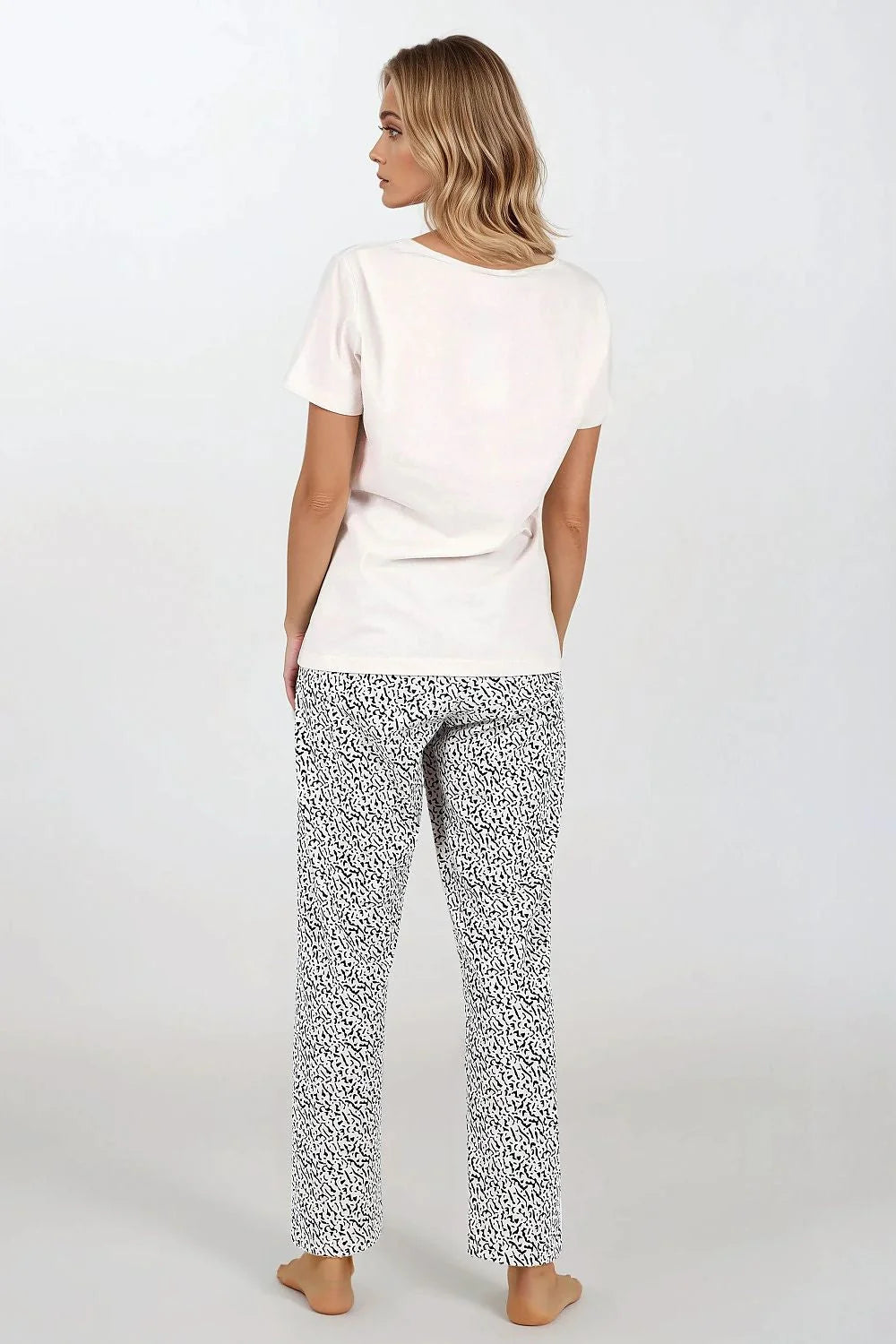 Pyjama pour femme en coton confortable et moderne, deux pièces, manches courtes, motifs abstraits, pantalon large, idéal pour détente