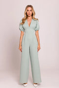Combinaison élégante pour femme en vert pastel, manches bouffantes, taille ajustée, jambes évasées, fermeture éclair dissimulée, polyester et élasthanne