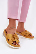 Sandales compensées pour femmes design moderne été 2023 talon 7cm couleur moutarde semelle blanche nœud asymétrique style décontracté chic