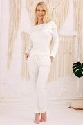 pyjama Mary femme ivoire viscose élasthanne manches longues encolure ronde volant diagonal poignets froncés pantalon slim cordon poches dentelle subtile
