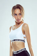 Soutien-gorge sportif féminin moderne dos ouvert élastiques croisés tissu respirant coton elasthanne polyamide
