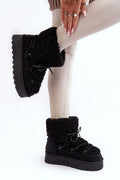 Bottines de neige pour femme en fausse fourrure noire texture bouclée style casual sophistication semelle caoutchouc antidérapante enfilage facile