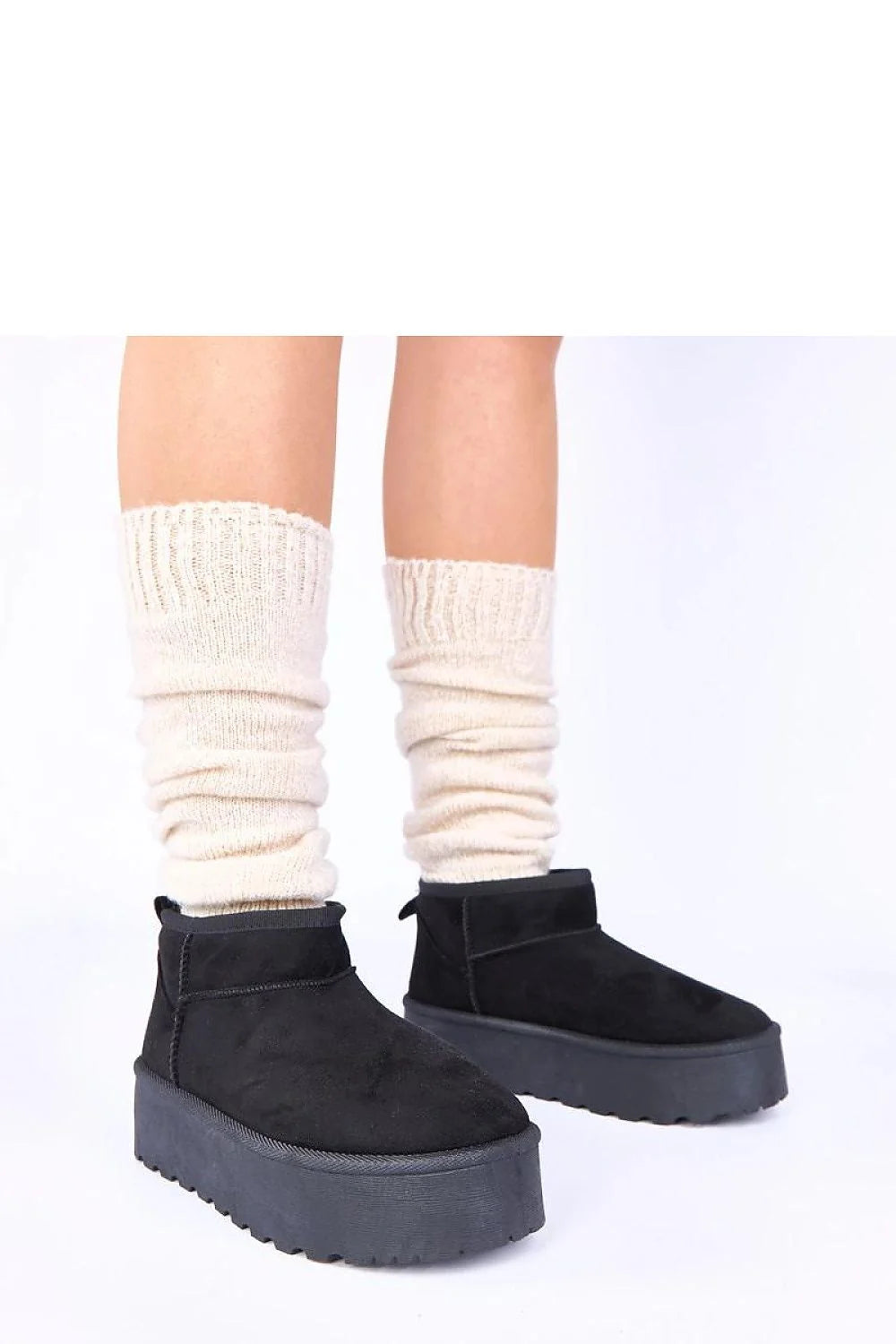 bottes neige noires plateforme fourrure doublure chaude semelle crantée antidérapante suédine slipon cheville profilée confort urbain