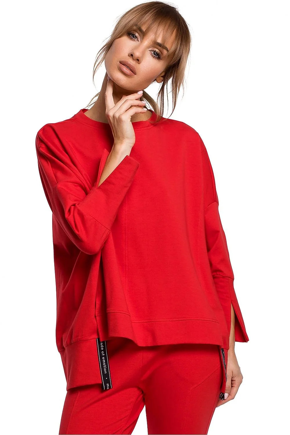 Sweatshirt ample coton noir moderne confortable manches longues fentes poignets pour femme décontractée élégante