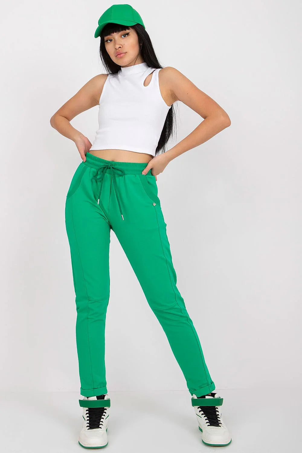 pantalon survêtement femme fuchsia vif taille haute élastique cordon serrage embouts métalliques slim fuselé cheville poches latérales stretch