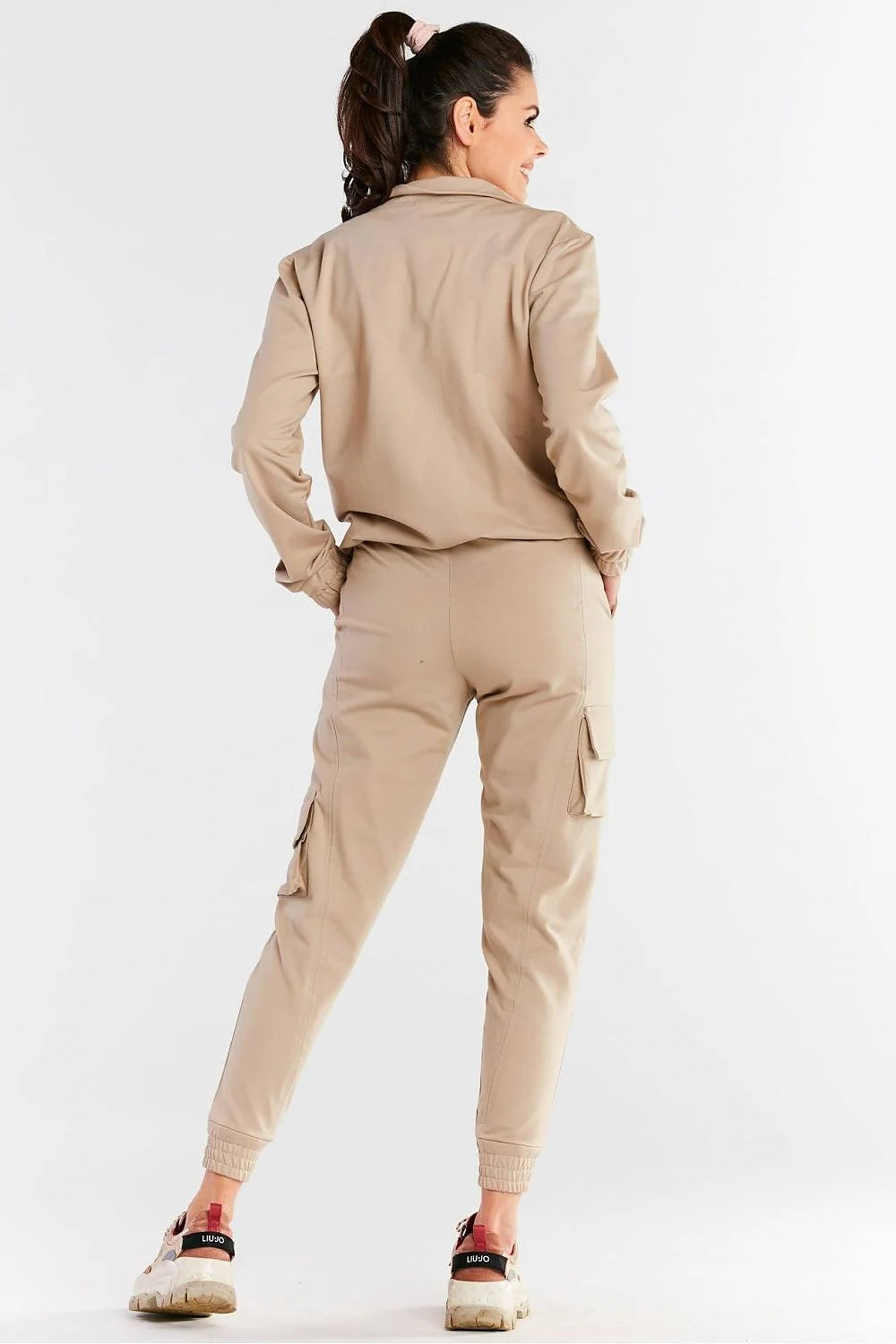 Ensemble sportif femme jaune fluo veste pantalon survêtement style moderne coupe ample col montant fermeture éclair élasthanne polyester respirant