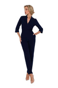 combinaison femme bleu marine tailleur chic col châle V manches trois quarts taille cintrée jambes droites cheville tissu structuré lisse
