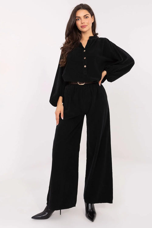 pantalon velours côtelé noir femme taille haute élastique ceinture boucle dorée jambes larges coupe ample poches latérales minimaliste