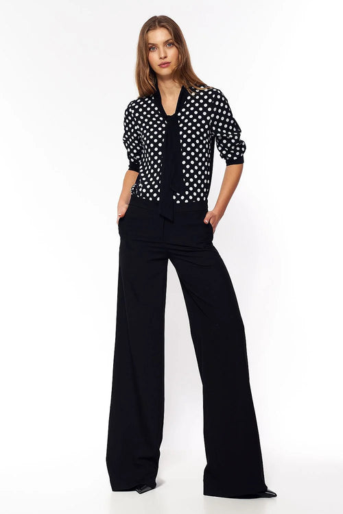 pantalon palazzo noir taille haute jambe extra large poches latérales tissu fluide viscose polyester élasthanne confortable silhouette allongeante bureau soirée