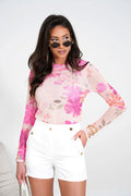 Chemisier La Balancia en tulle transparent manches longues floral rose fuchsia pêche short blanc taille haute occasion chic