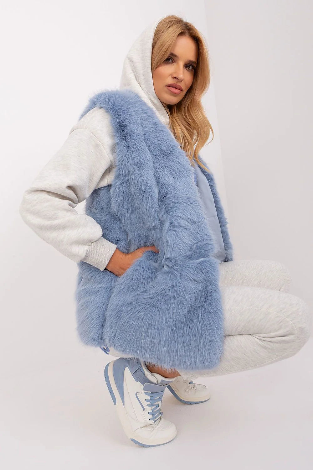 Veste sans manches en fausse fourrure moderne élégante bleu pastel longue coupe droite pour femme
