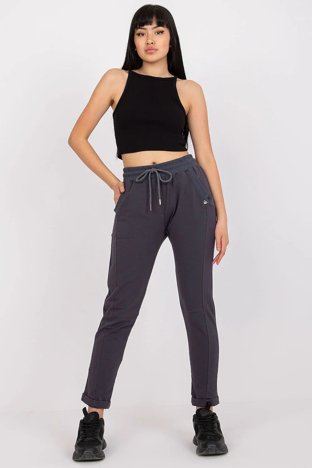 pantalon survêtement femme fuchsia vif taille haute élastique cordon serrage embouts métalliques slim fuselé cheville poches latérales stretch
