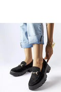 Mocassins femmes élégance moderne couleur noire tige daim nappa semelle épaisse dorée métal finitions précises occasion versatile